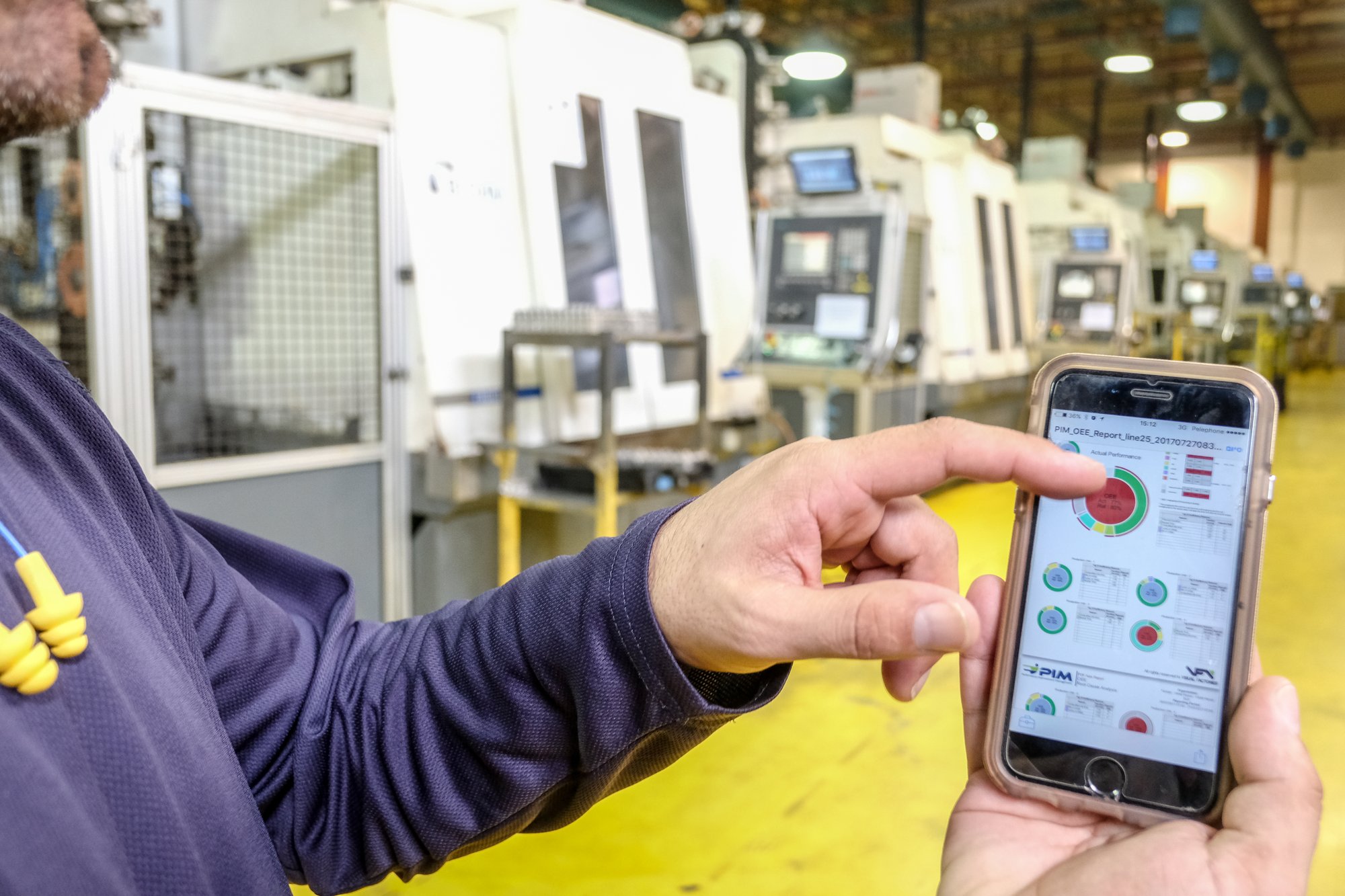 Visual Factories app on a phone on the shop floor